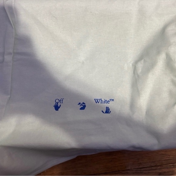 Off-White Tee with Blue Logo